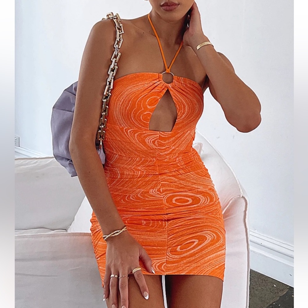 Beautiful orange swirl ruched dress with halter tie up. NWT never worn! 🧡
